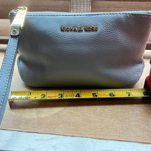 Brand new never used Michael kors wristlet, with card holder inside